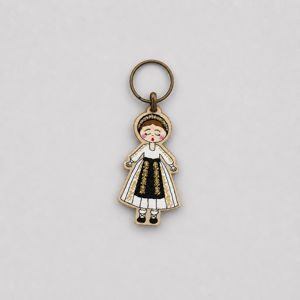 Keyring Ethno Croatia - Levanjska Varoš (Osijek-Baranja) Keychain with a character in traditional attire on a light gray background