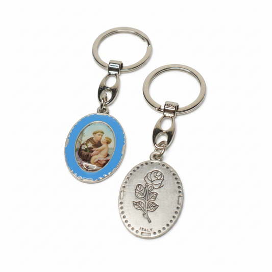 Keyring Saint Anthony of Padua – Double-Sided Religious Medal (Blue Enamel) Two keychains with different designs on a white background
