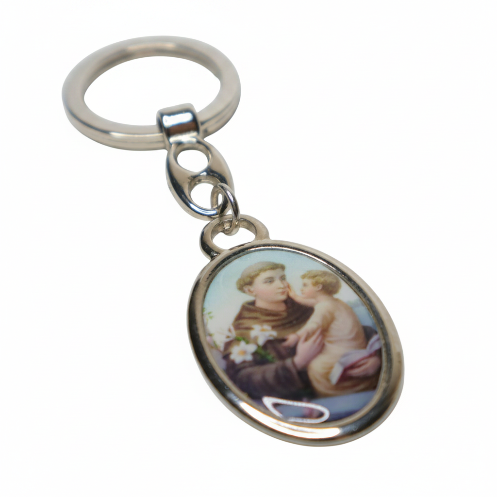 Keyring Saint Anthony of Padua – Silver-Tone Religious Medal (oval) Keychain with a circular pendant featuring an image of a saint and child on a white background