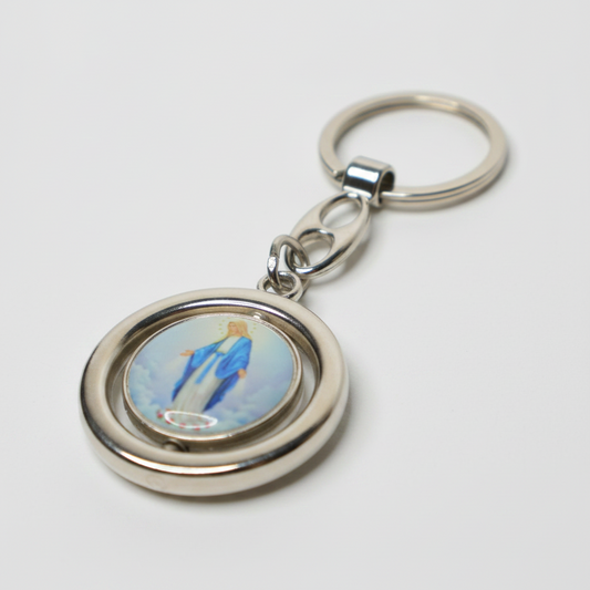 Keyring Virgin Mary & Saint Anthony Rotating Spinner Keychain with a spinning disc featuring an image of a person in a blue outfit on a white background