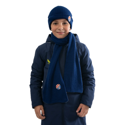 Kids Knitted Scarf and Beanie Dinamo Zagreb Child wearing a navy blue outfit with a matching hat and scarf on a white background