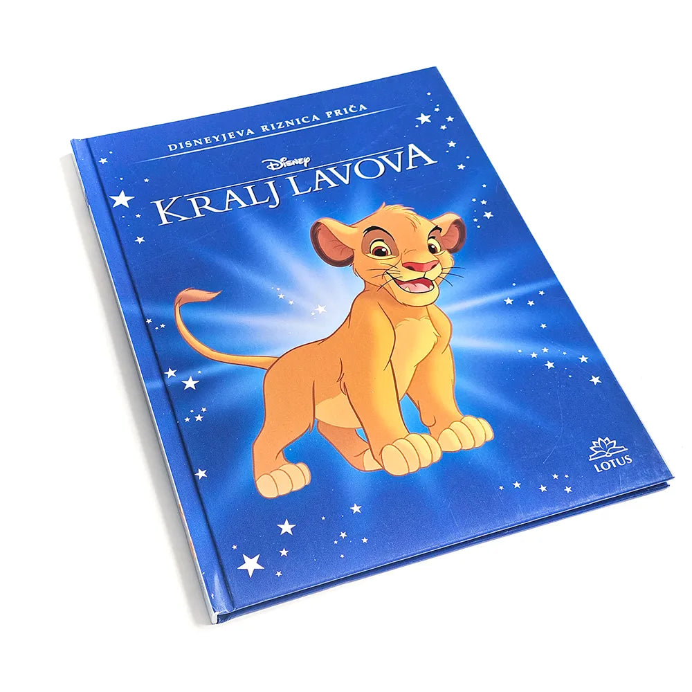 Kralj Lavova by Disney Disney book cover featuring a lion cub on a blue background with stars.