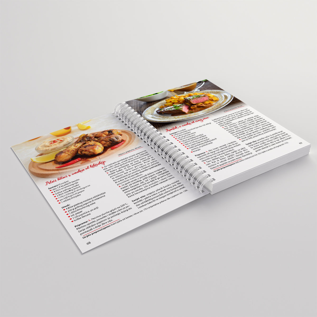 Kuhaj Slano, Kuhaj Fino! Open cookbook showing recipes with images of food on a light gray background