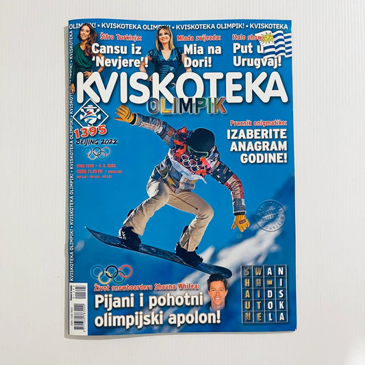Magazine cover with a snowboarder on a blue background