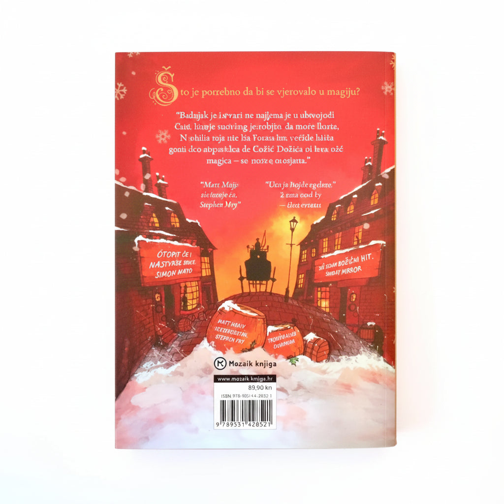 Matt Haig – Djevojčica Koja je Spasila Božić (The Girl Who Saved Christmas) Book cover with a snowy village scene and red text on a white background
