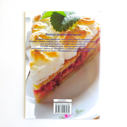 Mediteranske Travarice i Likeri Cake packaging with a slice of cake on a white background