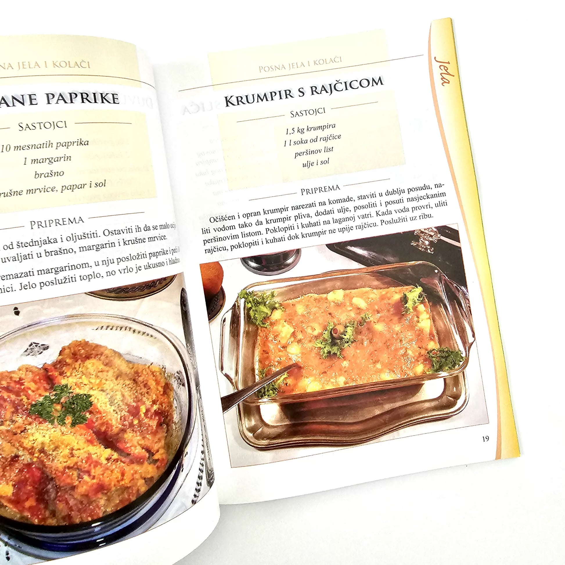 Naša Najljepša – Posna Jela Open cookbook showing a recipe for a dish with a glass dish on a white background