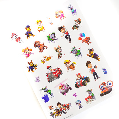 Paw Patrol - Odgonetni i Oboji Sheet of colorful cartoon stickers featuring various characters on a white background