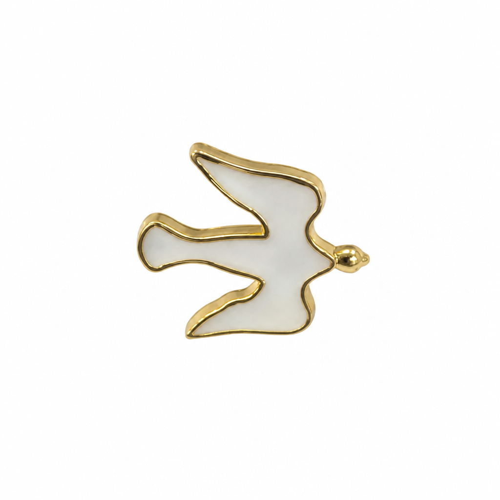 Pin Međugorje - Dove A flying dove brooch with a polished gold-tone outline and white enamel fill, shown on a plain white background.