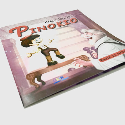 Pinokio Book cover of 'Pinokio' with illustrations of Pinokio and an old man on a bench.