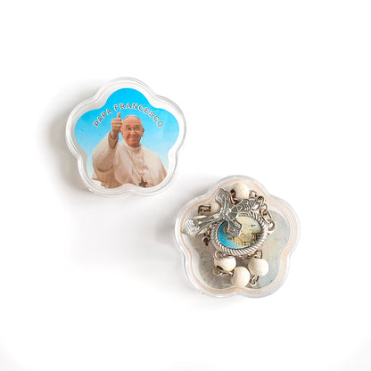 Pope Francis White Catholic Rosary with Vatican Souvenir Case Two decorative items with Pope Francis on one and a religious symbol on the other, on a white background.