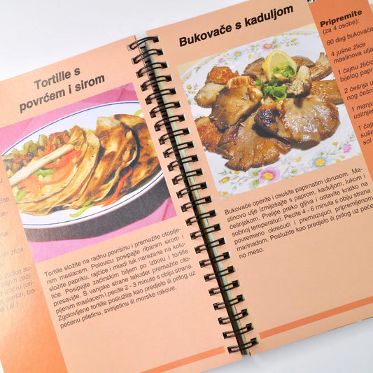 ROŠTILJ u Domu i Prirodi Open cookbook showing pages with food images and text