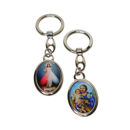 Religious Croatian Metal Keyring – Dual‑Sided Devotional Pendant Two keychains with religious-themed images on a white background