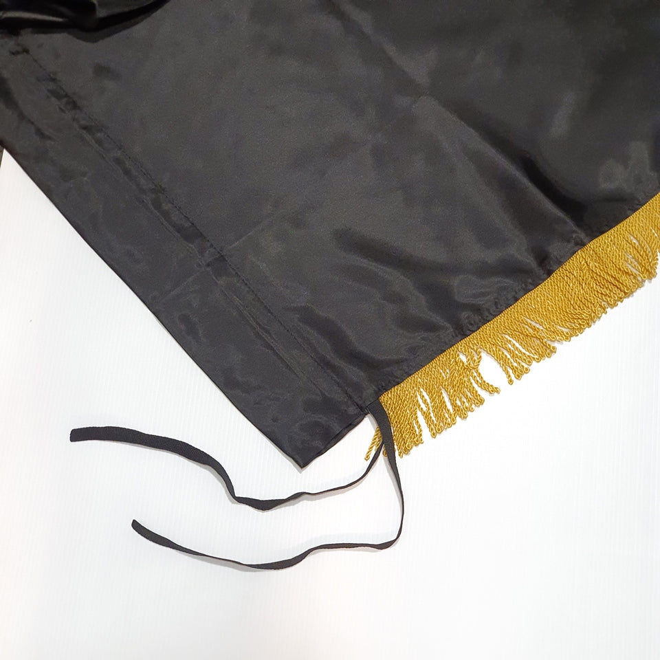 Silk Flag Plain Black with gold fringes 200cm x 100cm Black graduation gown with gold trim on a white background