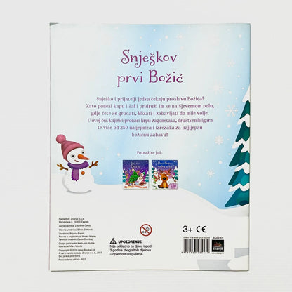 Snješkov Prvi Božić Back cover of a children's book with a snowman, Christmas tree, and text on a light blue background.