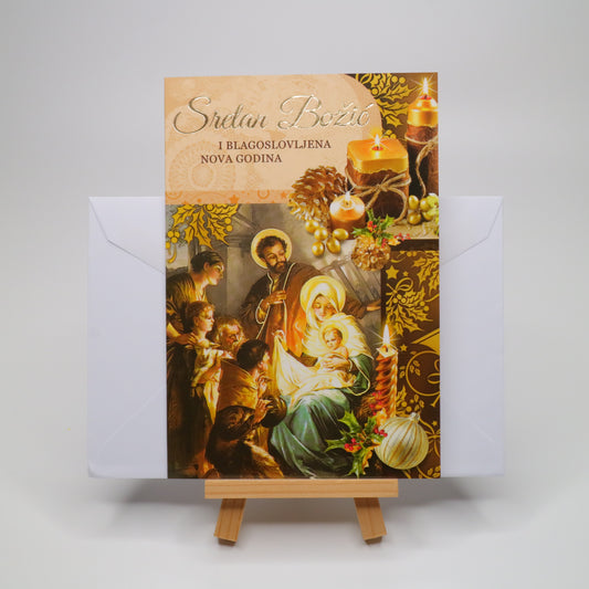 Sretan Božić Golden Christmas Greeting Card Decorative card with religious design on a stand against a white background