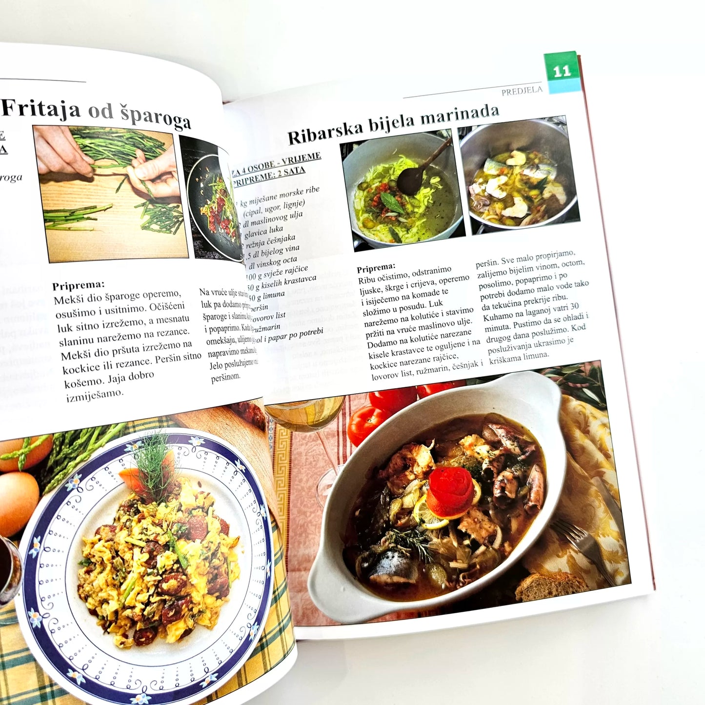 Tradicionalna Hrvatska Jela Open cookbook showing recipes with images of food on a white background