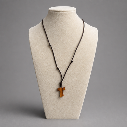 Traditional Međugorje Necklace (S) Necklace with a wooden cross pendant on a mannequin bust against a gray background shopncro