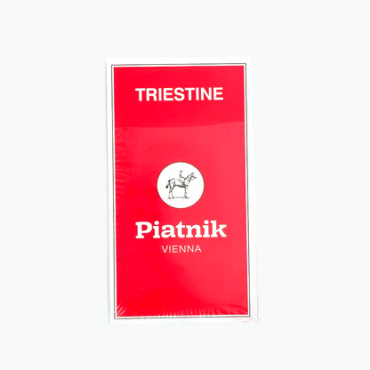 Triestine Piatnik Vienna Playing Cards Red card deck packaging with 'Triestine' and 'Piatnik Vienna' text on a white background