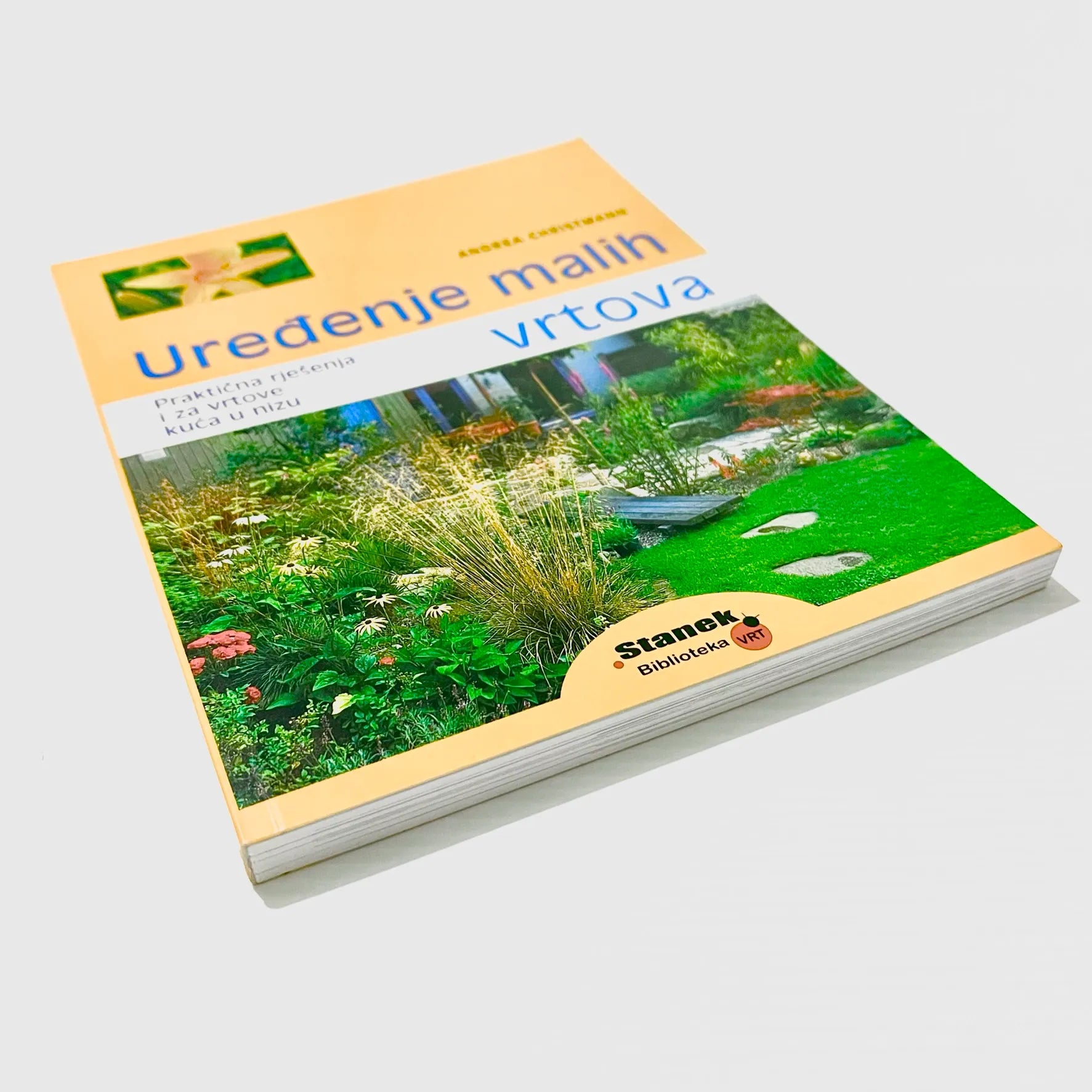 Uređenje Malih Vrtova - Practical solutions for small garden Book titled 'Uredenje malih vrtova' with a green cover showing garden images on a white background