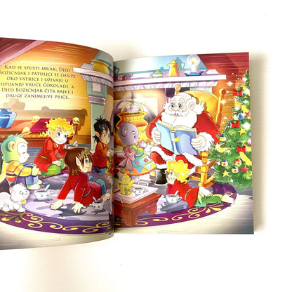 Čarobne priče - Božićne priče Open book with colorful illustrations of Santa Claus and children around a Christmas tree.